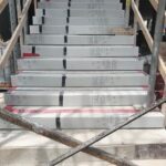 Staircase corner board protection during construction