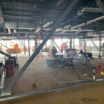 Skudo HT Commercial System placed over concrete, under staged building materials on a jobsite