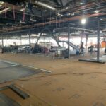 Skudo HT Commercial System protecting concrete from machinery and materials on a jobsite